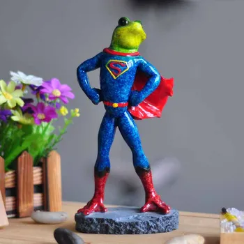 Bens Criativos Sapo Artesanato Decorativo Pastoral Resinas Presentes Decoração Do Escritório De Desenho Animado Do Superman